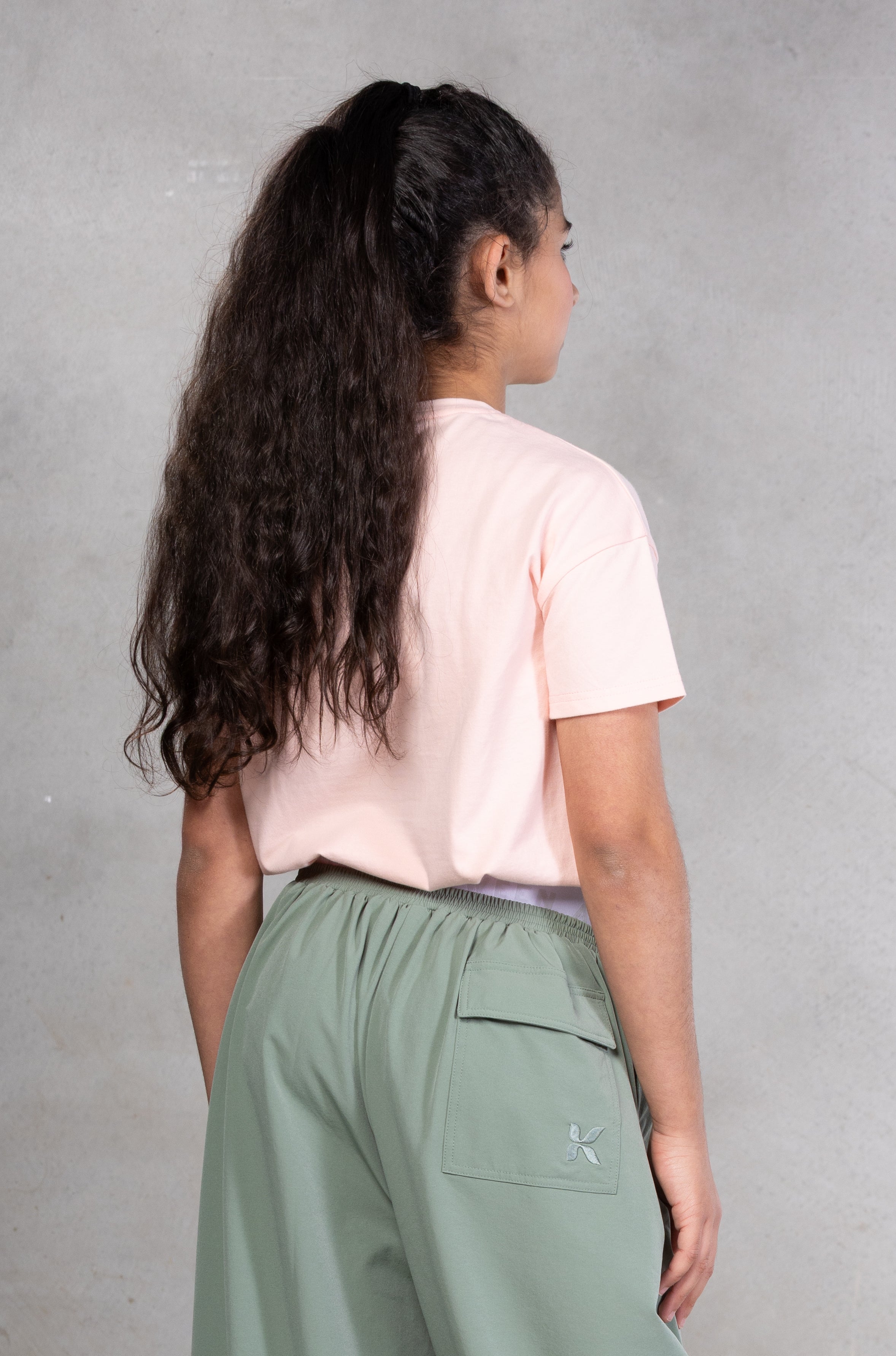 pink tshirt grey lower