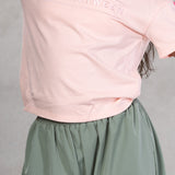 pink tshirt grey lower
