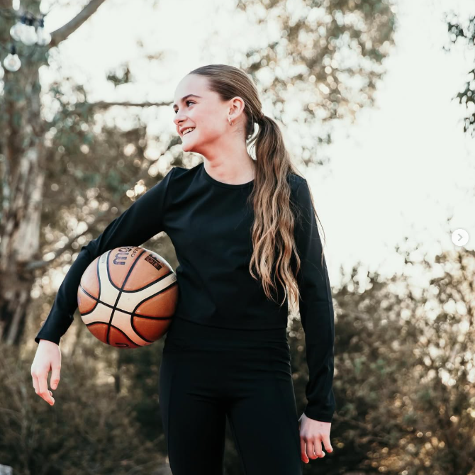 Girl in black outfit